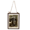 Two men hanging frame